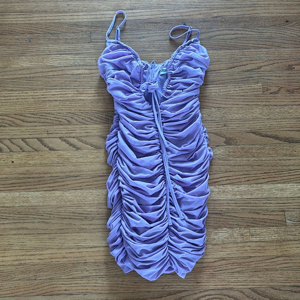 Mistress rocks purple dress